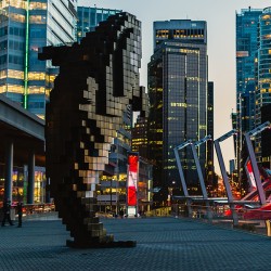 Vancouver street scene featuring Orca sculpture 
