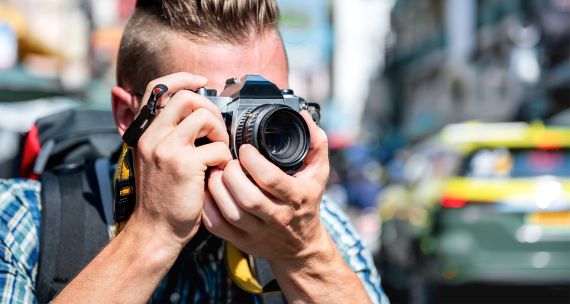 Close up of photo journalist